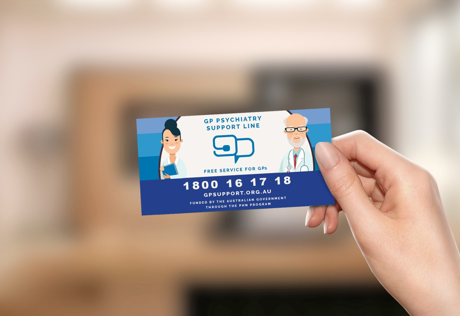 Person holding the GP Support Line card.