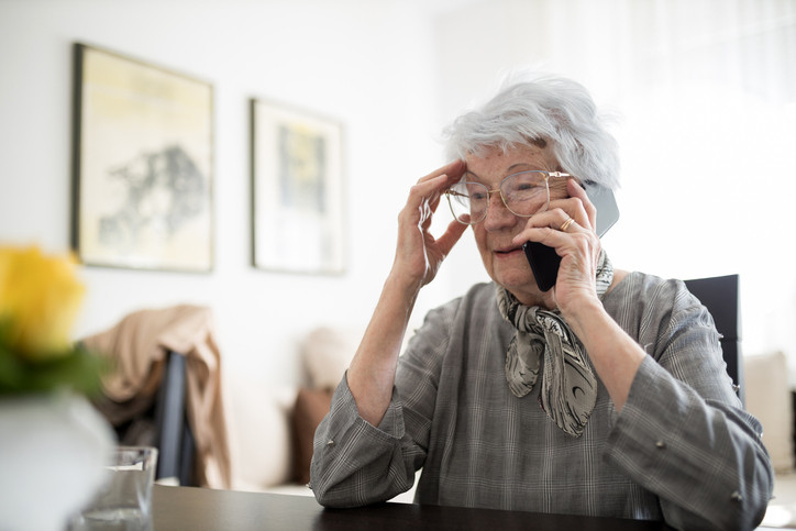 Older lady on the phone.