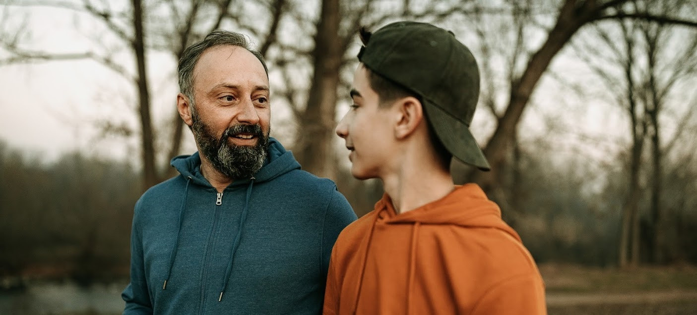 Father and son talking.