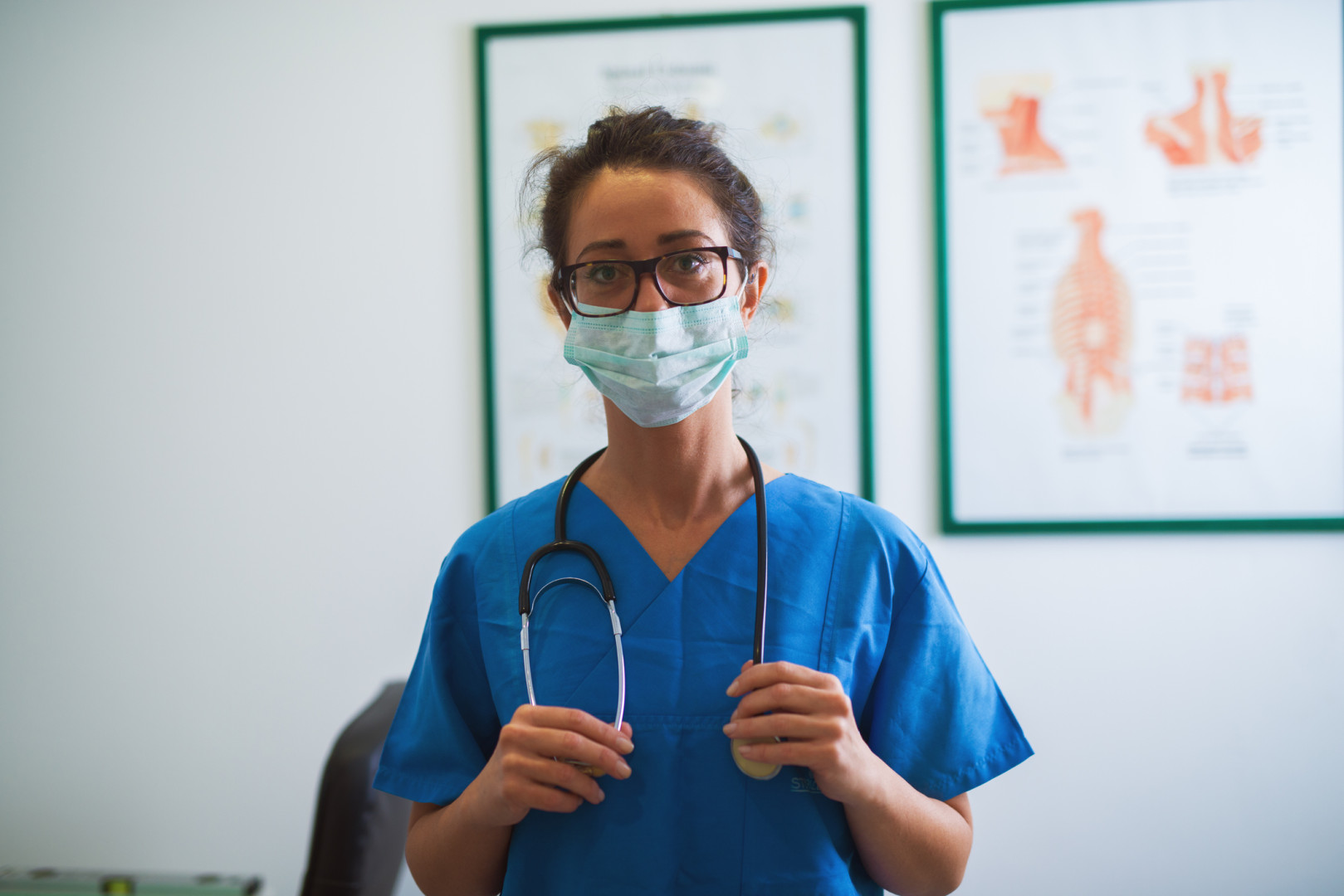 Nurse wearing surgical mask.